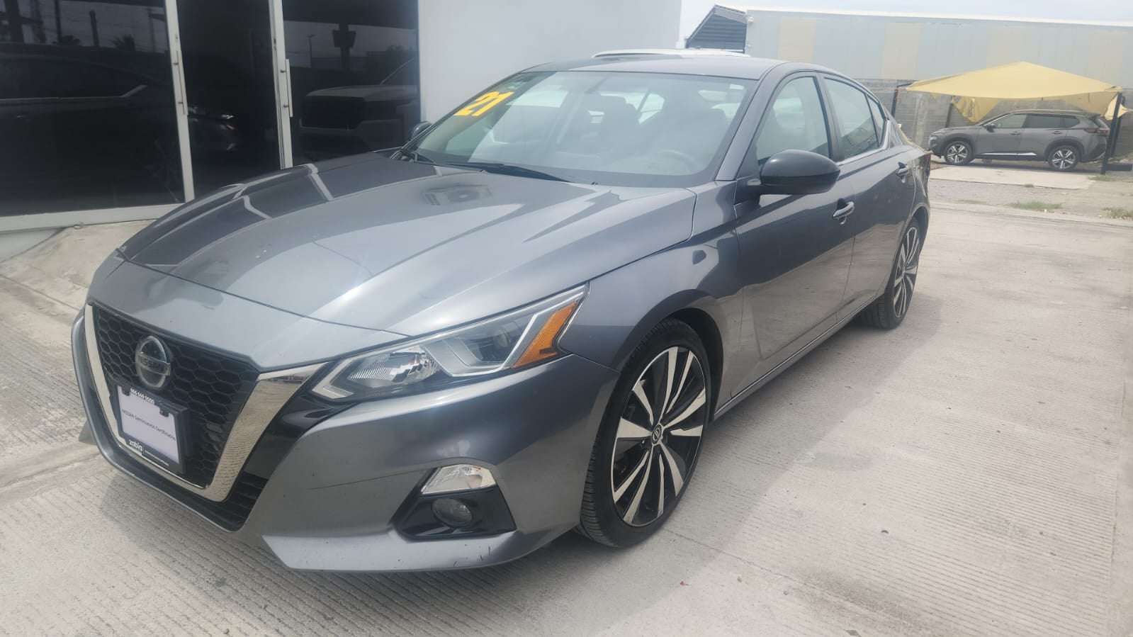 2021 Nissan Altima 4 pts. SR, 2.0T, CVT, a/ac., VE del., RA-19